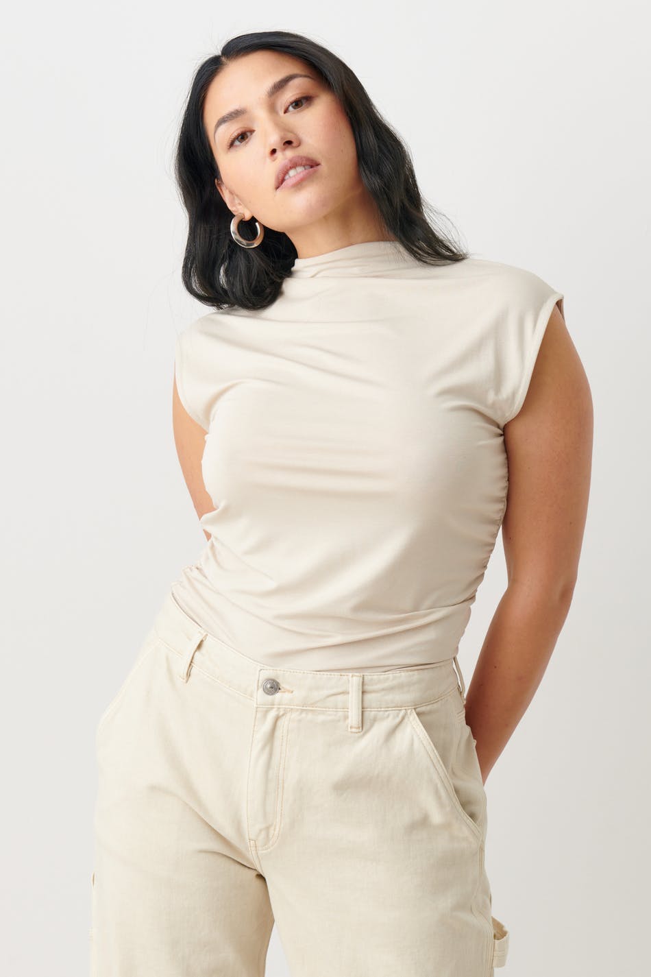 Soft touch funnel neck top