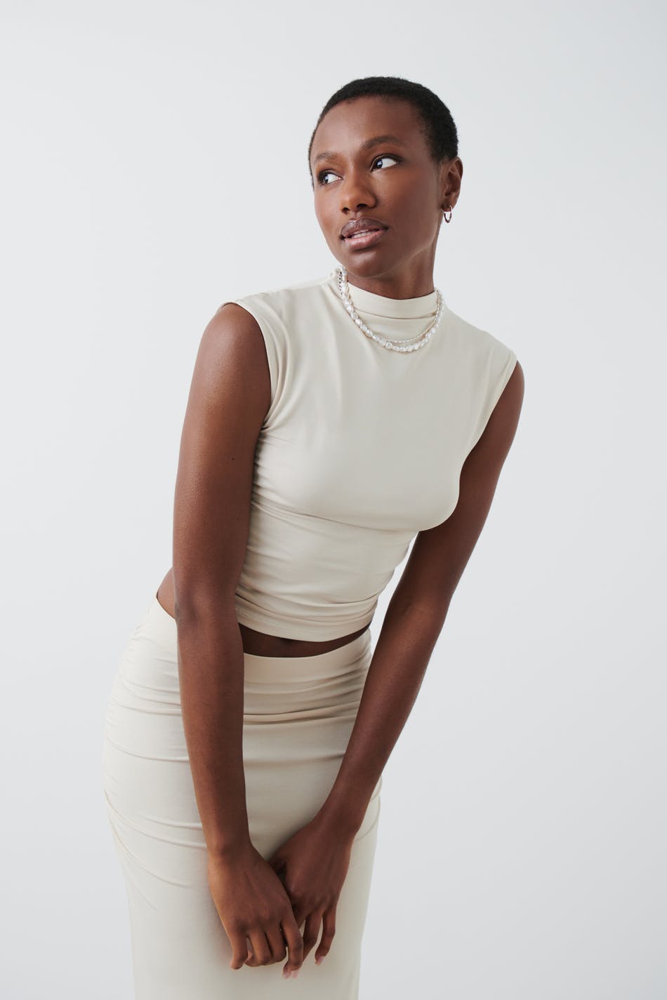 Soft touch funnel neck top