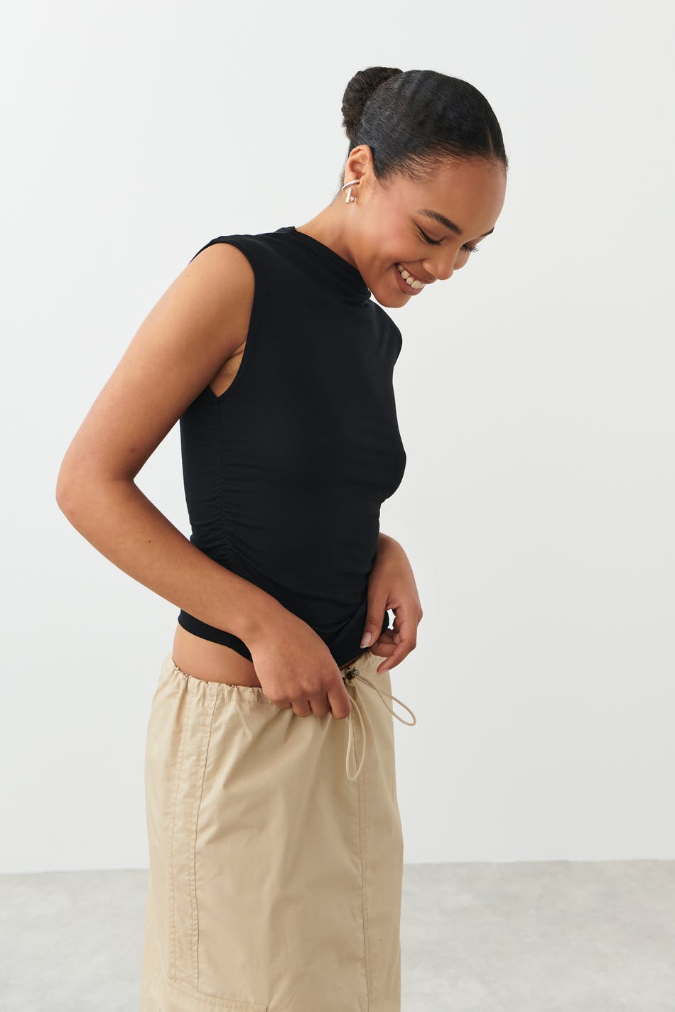 Soft touch funnel neck top