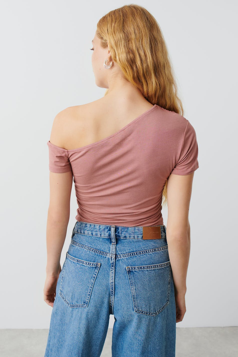 Soft touch asymmetric top
