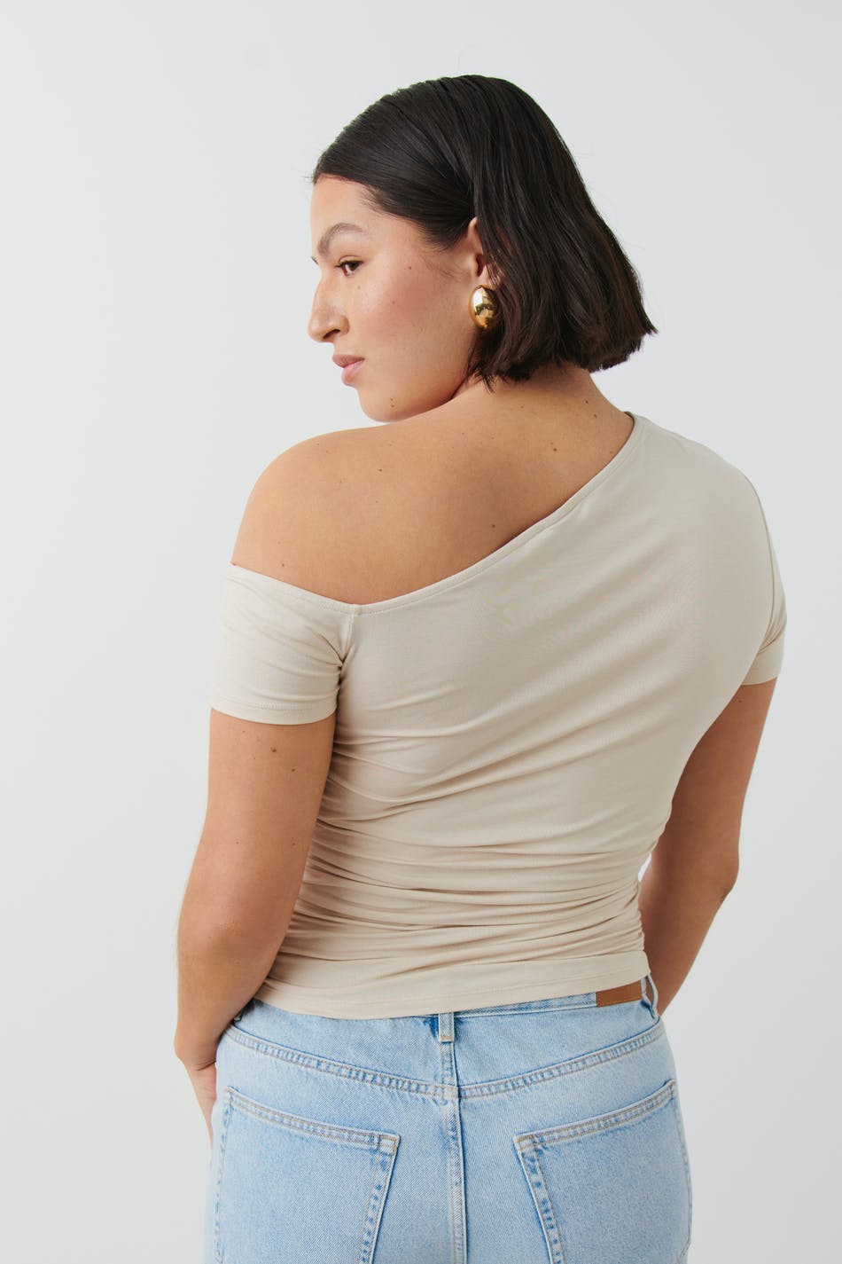 Soft touch asymmetric top