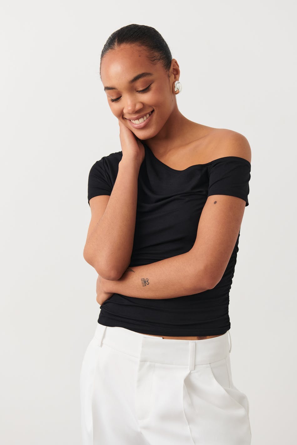 Soft touch asymmetric top