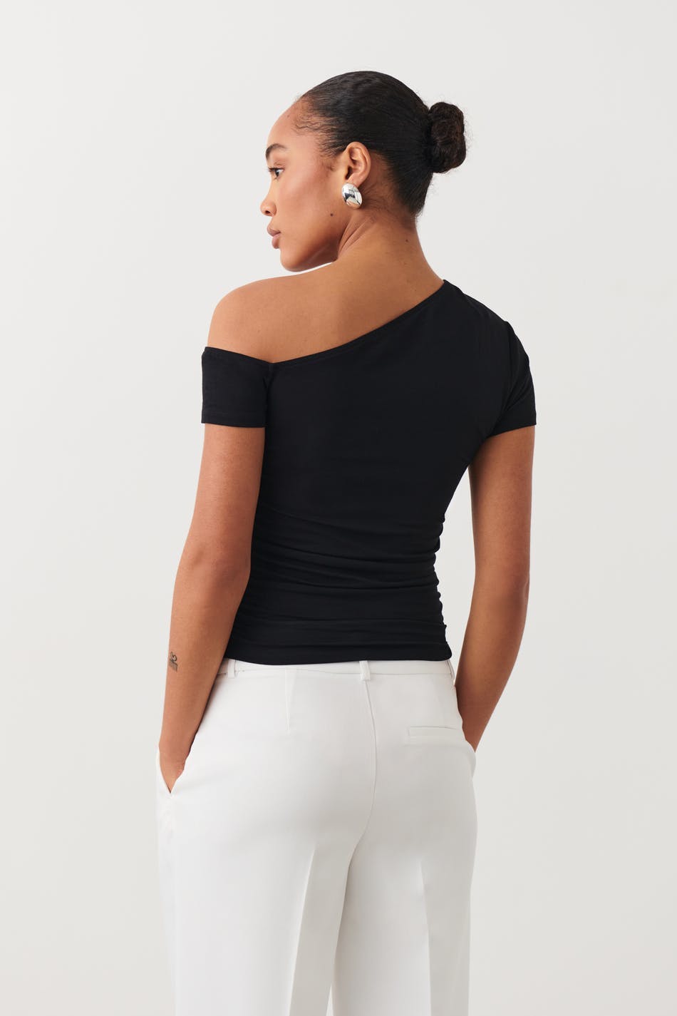 Soft touch asymmetric top