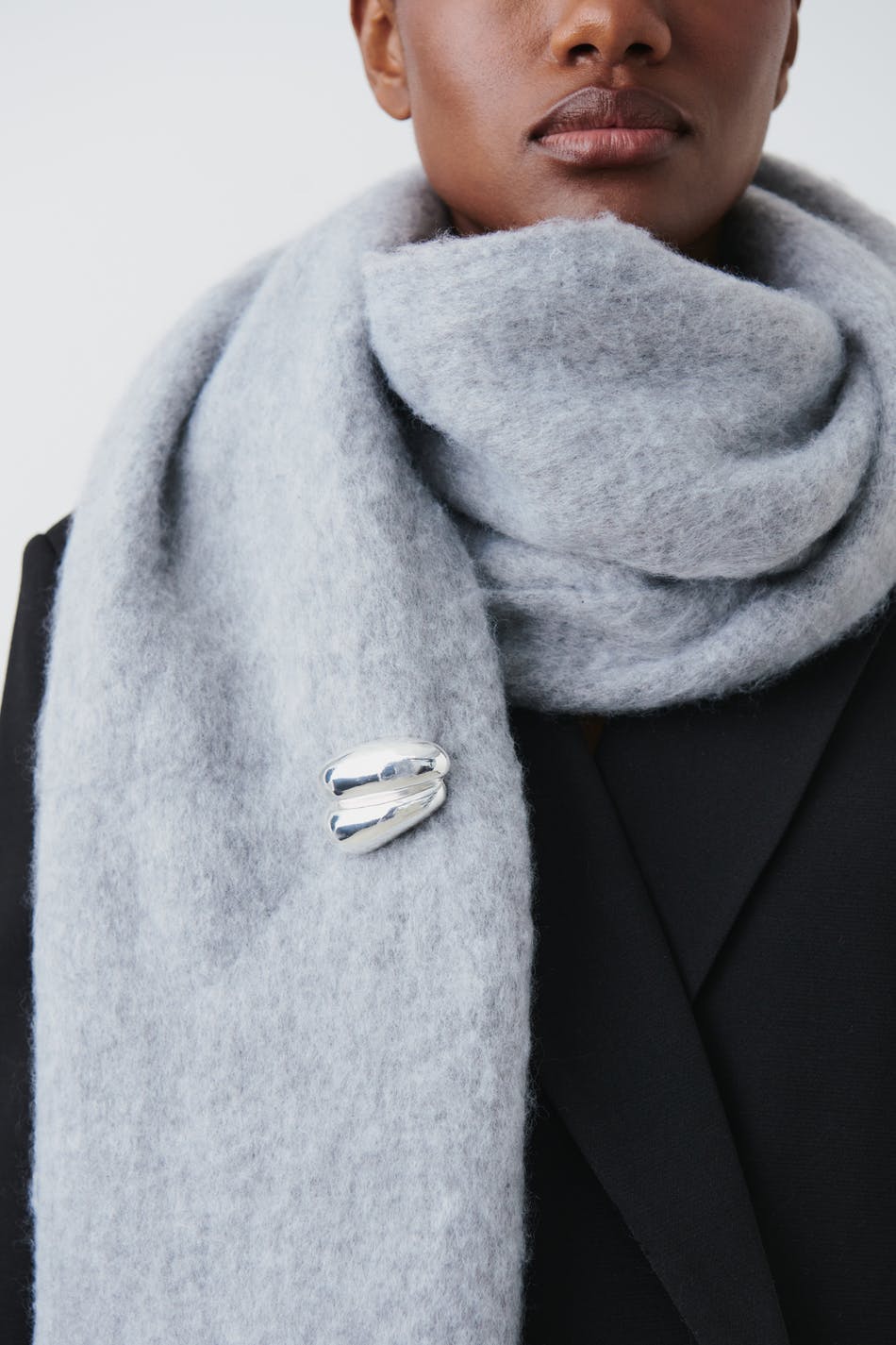 Uneven brooch