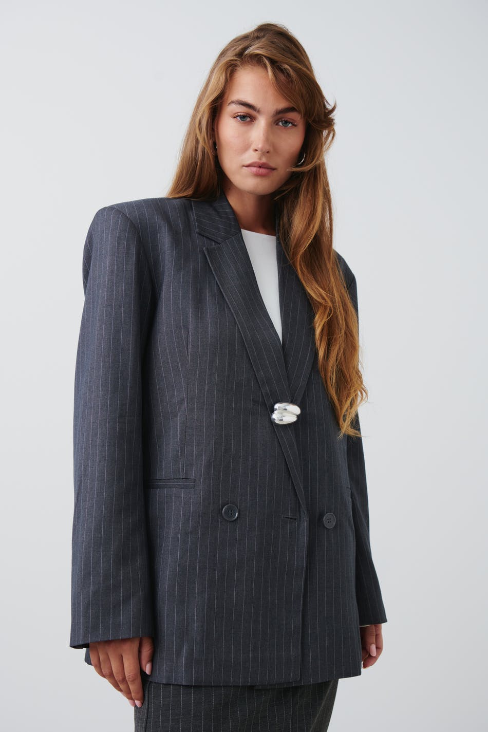 Uneven brooch