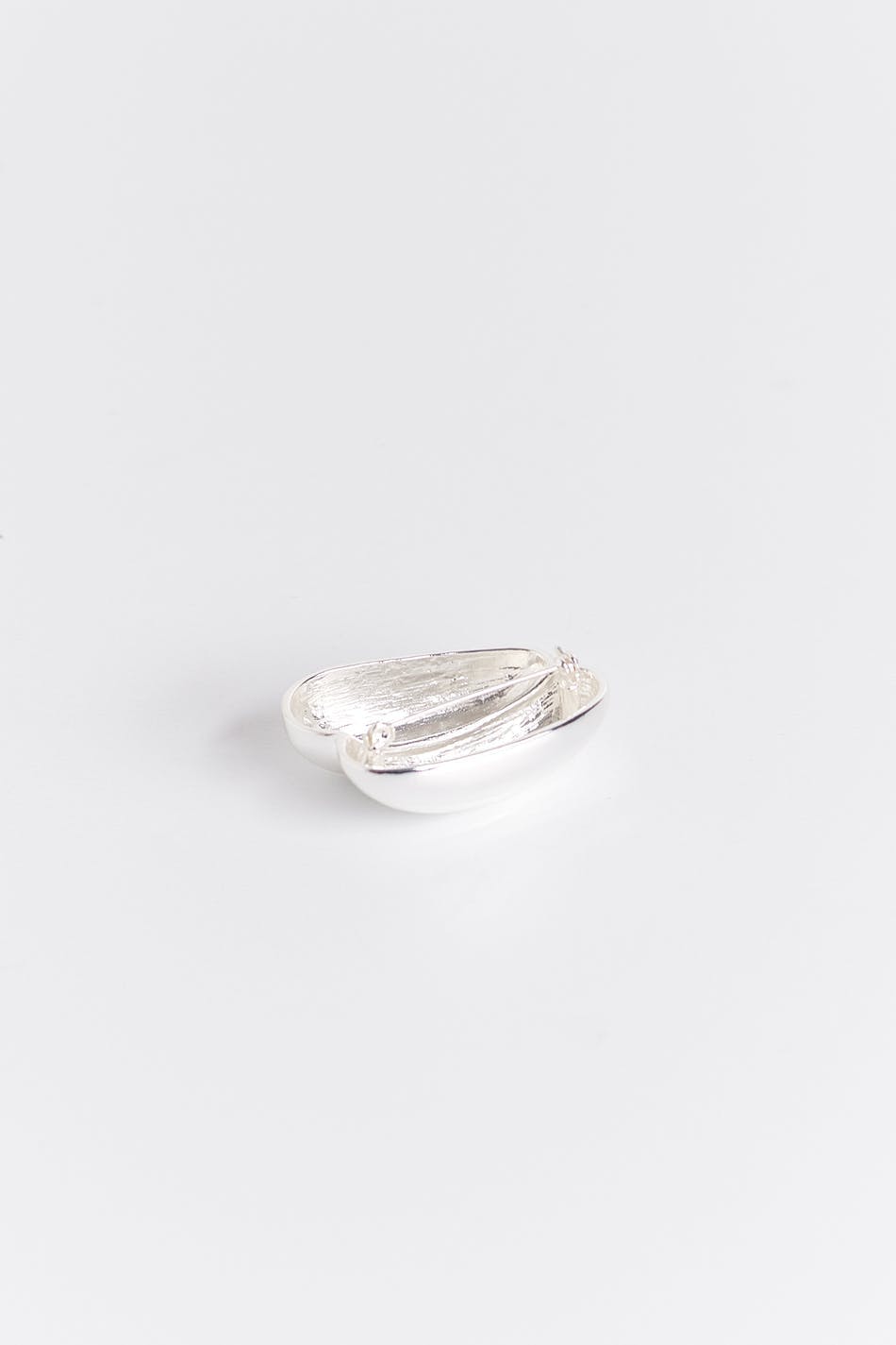 Uneven brooch