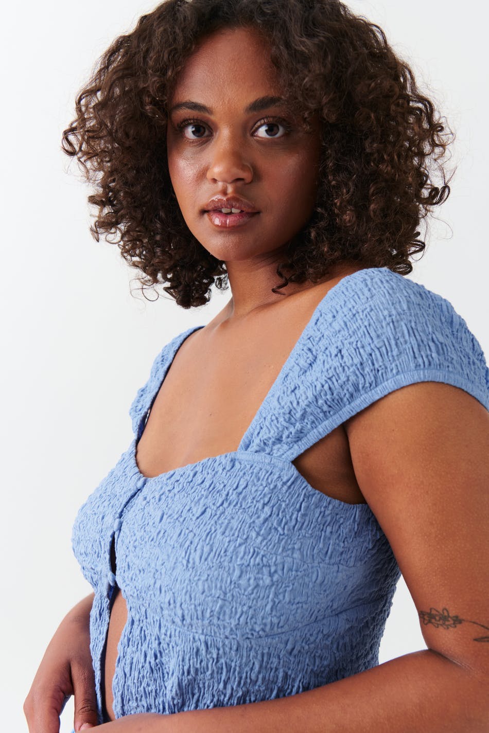 Structure button top