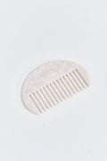 Curved hair comb