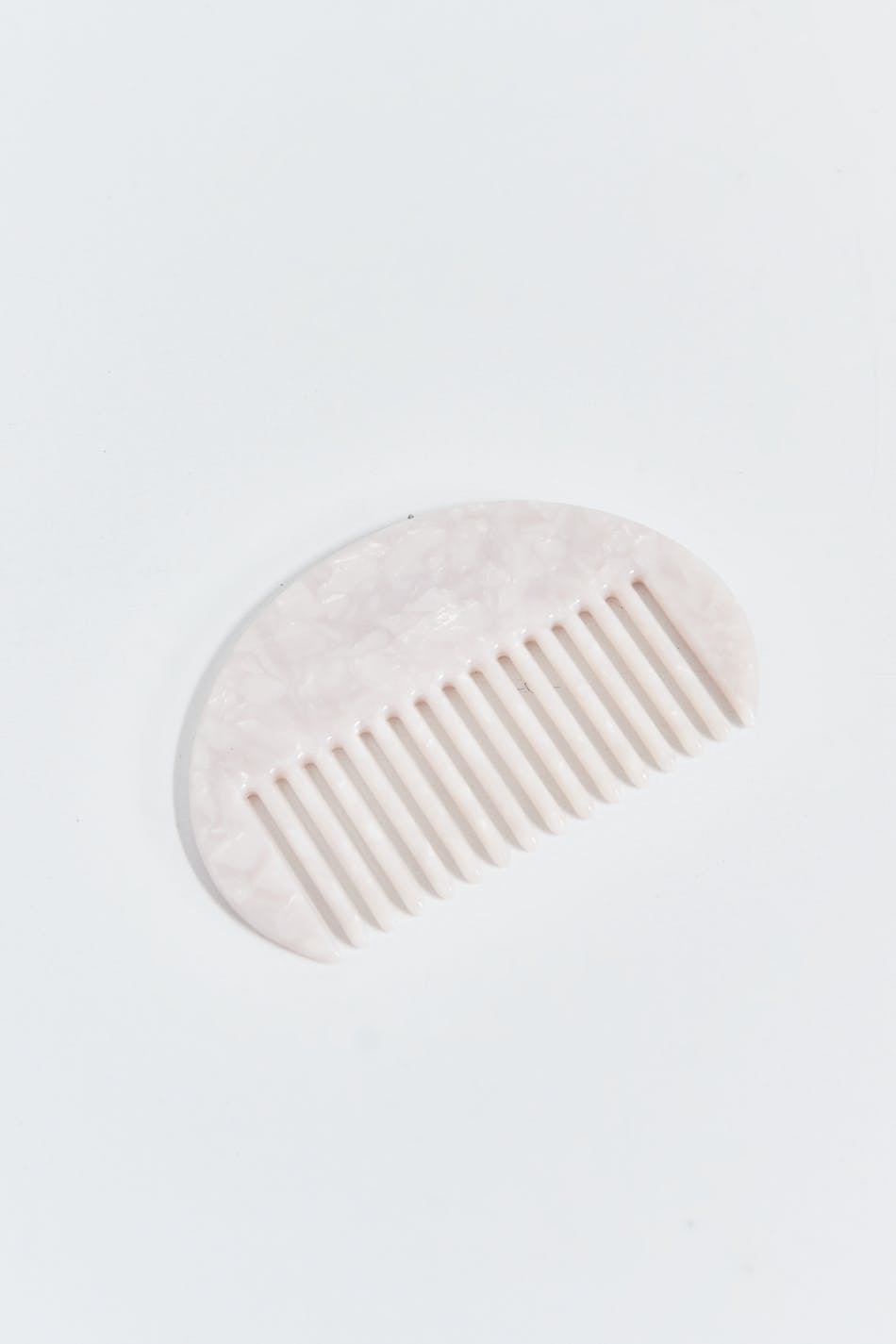 Curved hair comb