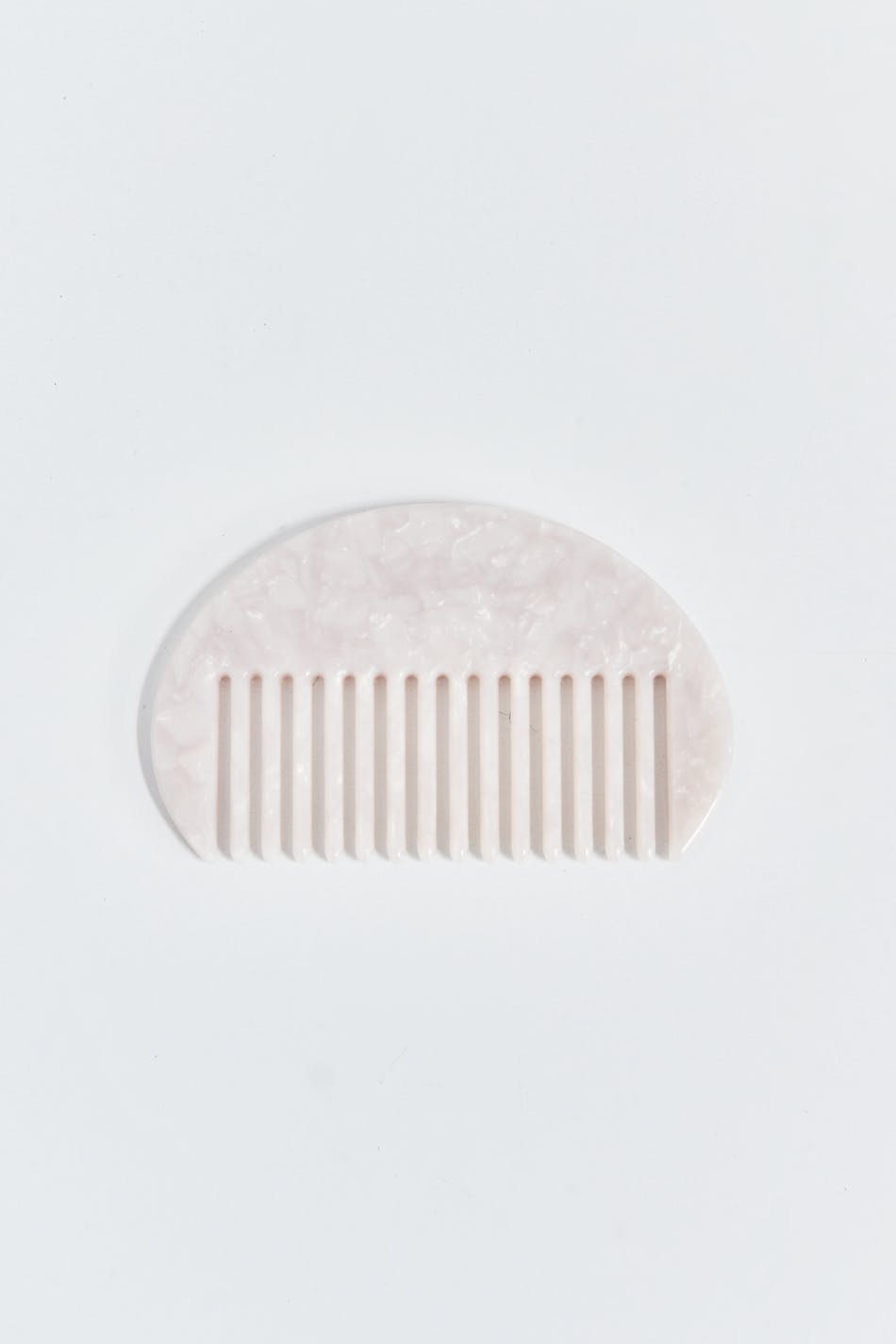 Curved hair comb