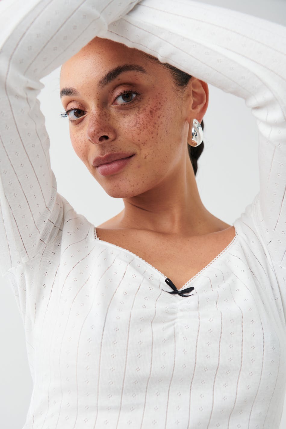 Pointelle bow top