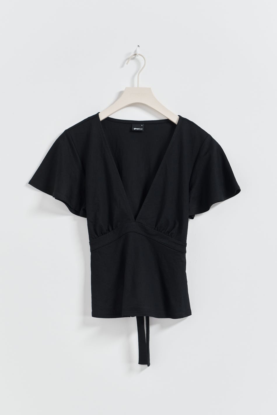 Tie top