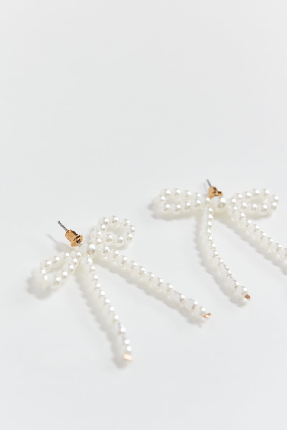 pearl bow earrings