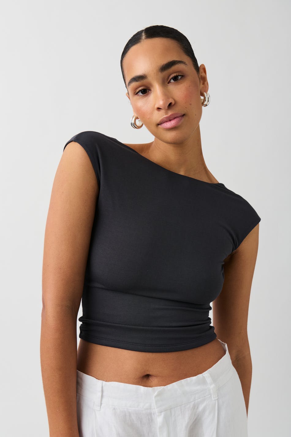 Soft touch open back top
