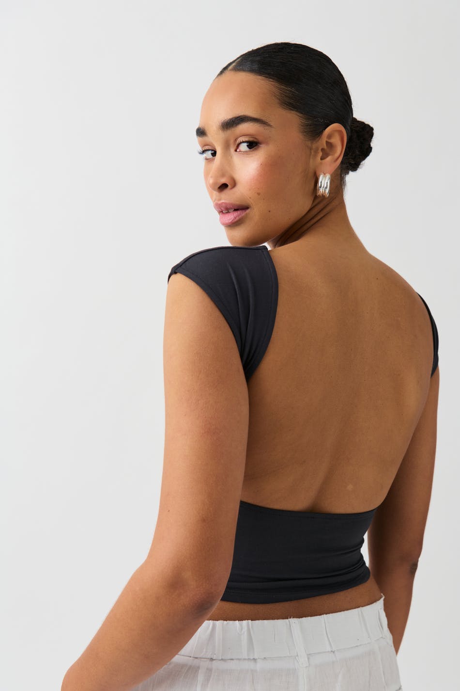 Soft touch open back top
