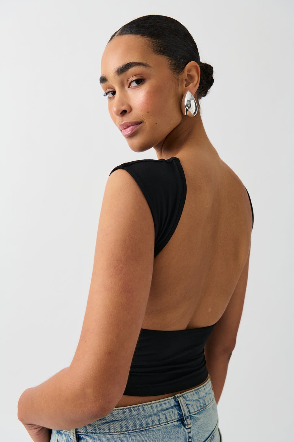 Soft touch open back top