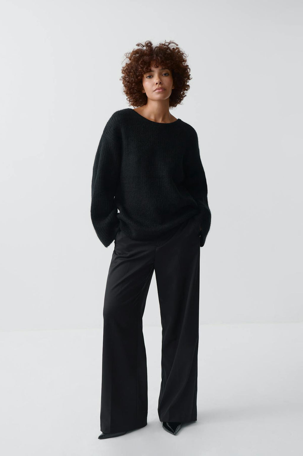 Knitted bow sweater