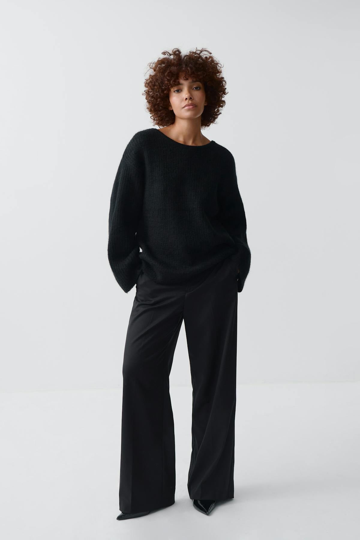 Knitted bow sweater