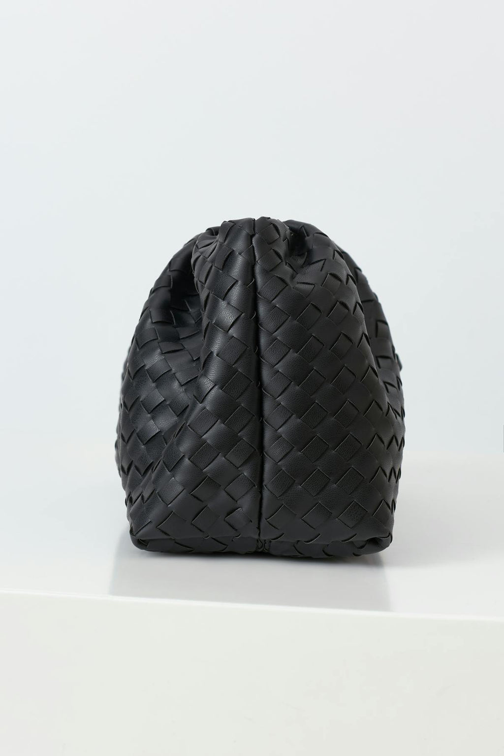 Braided clutch bag