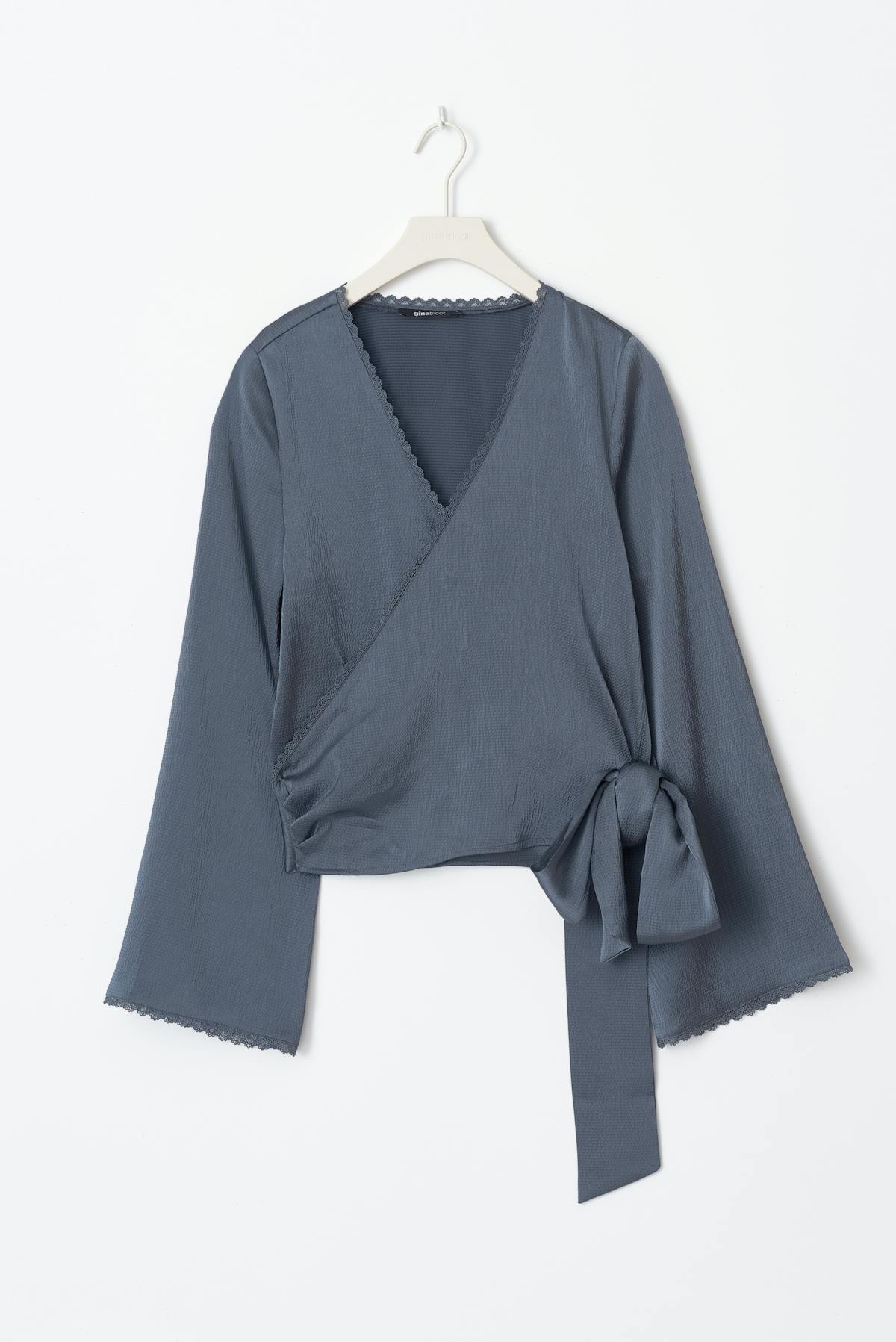 Scalloped edge wrap blouse
