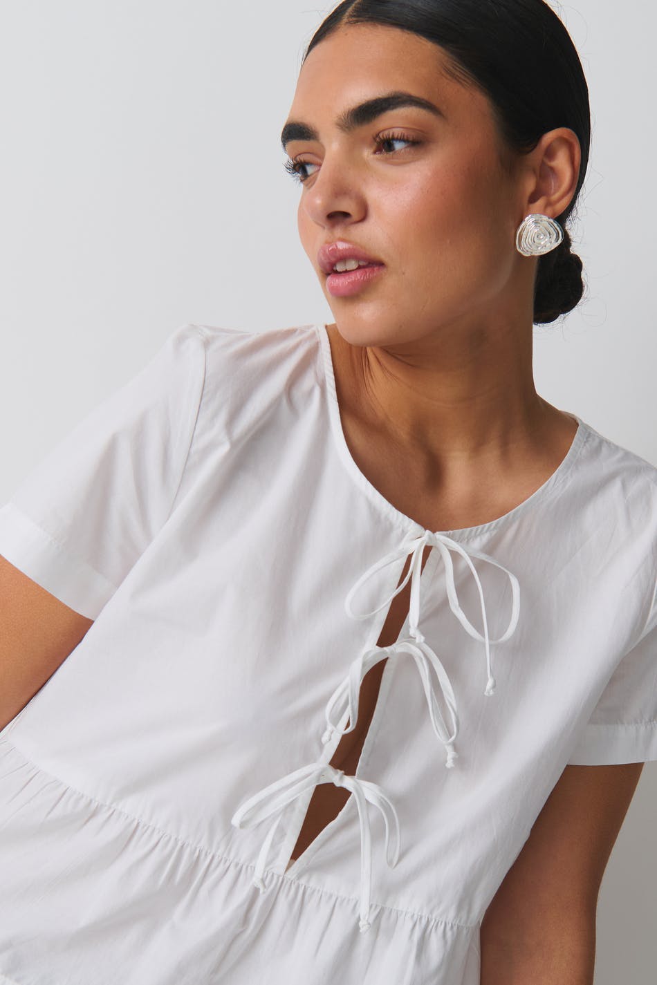 peplum tie blouse
