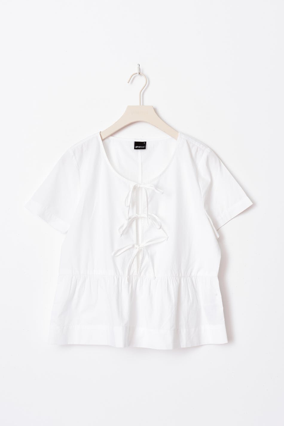 peplum tie blouse