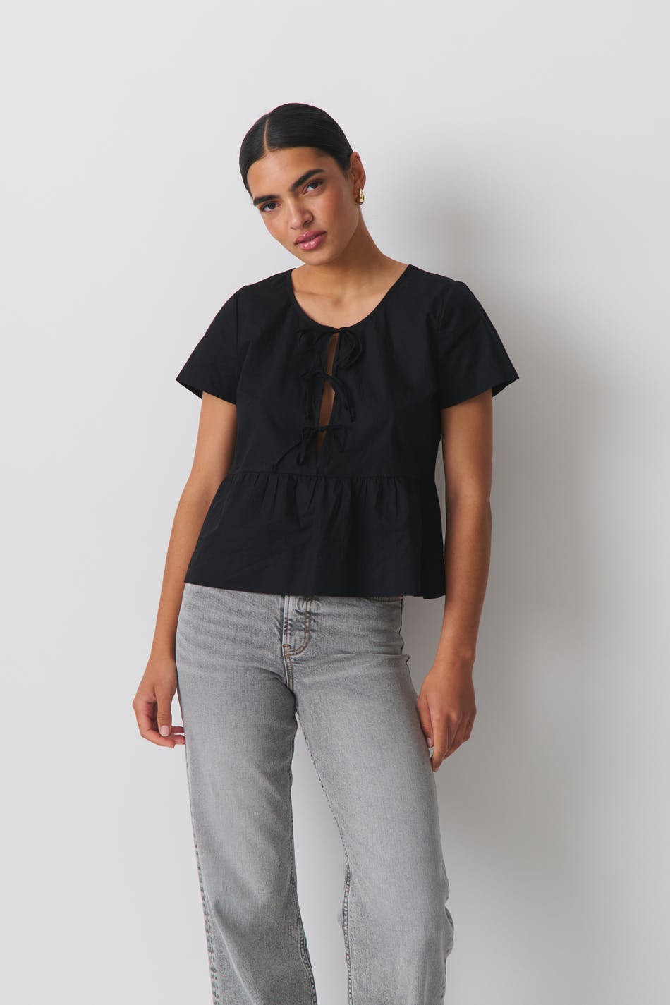 peplum tie blouse