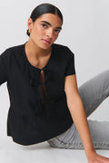 peplum tie blouse