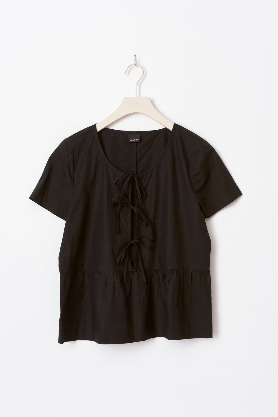 peplum tie blouse
