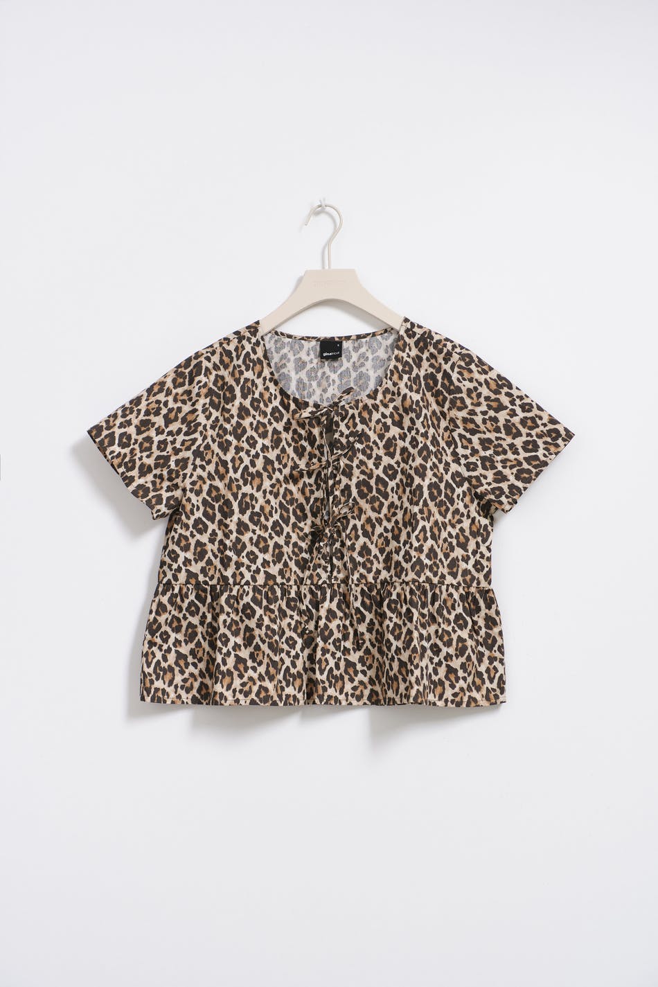 Peplum tie blouse