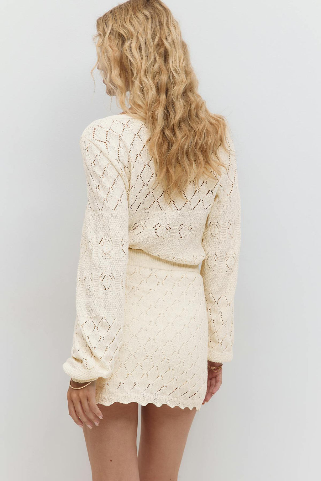 Knitted crochet mini skirt