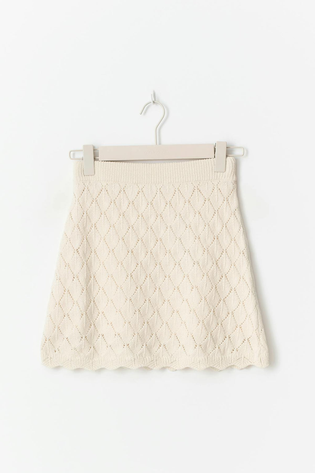 Knitted crochet mini skirt