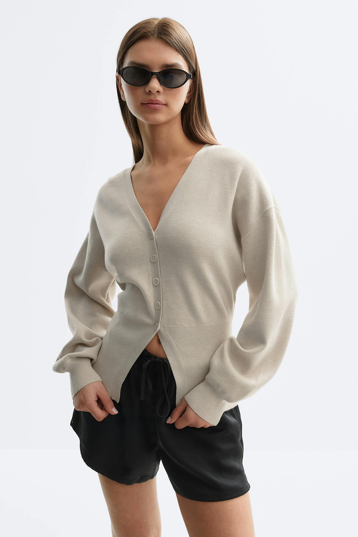 Shaped knitted cardigan