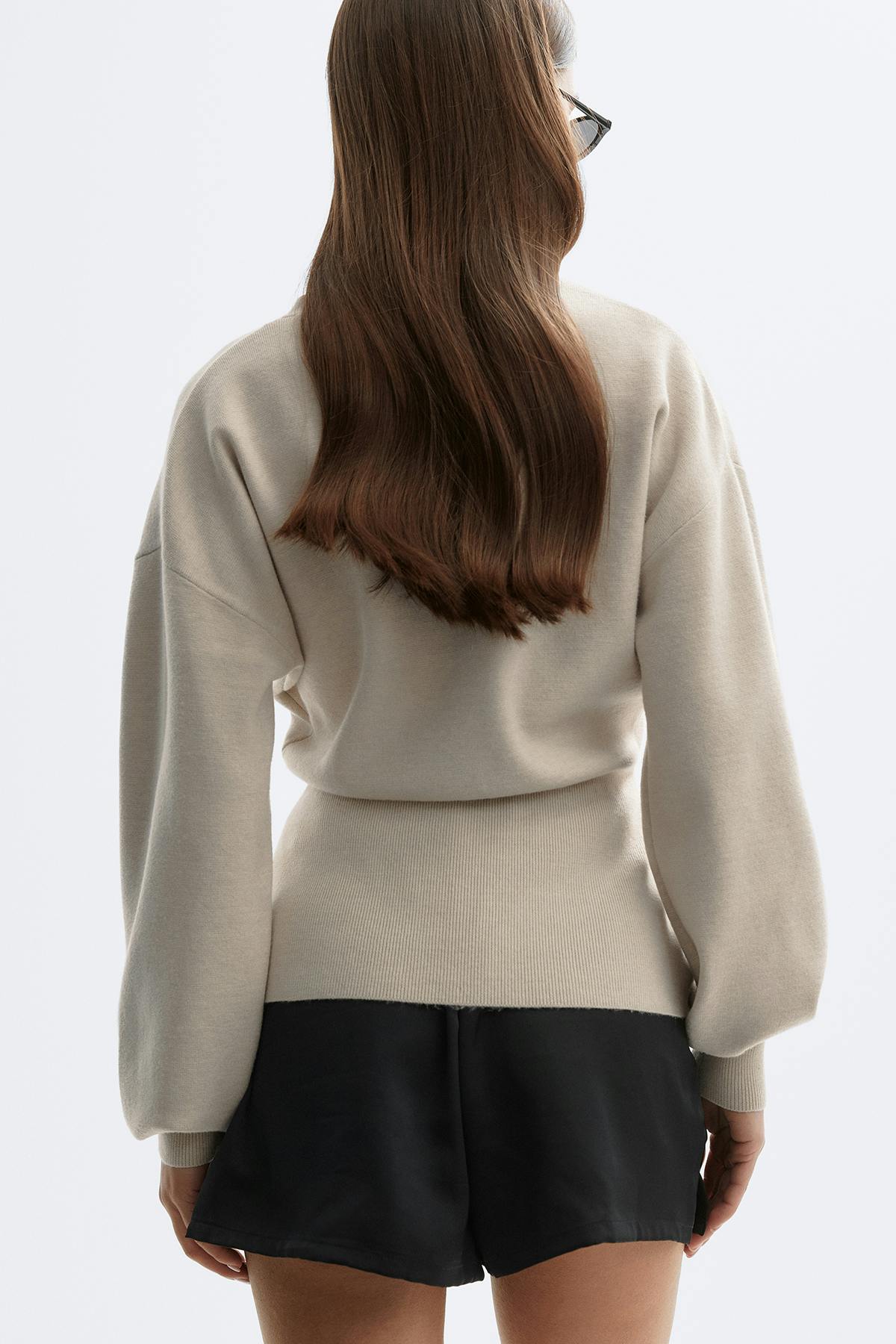 Shaped knitted cardigan