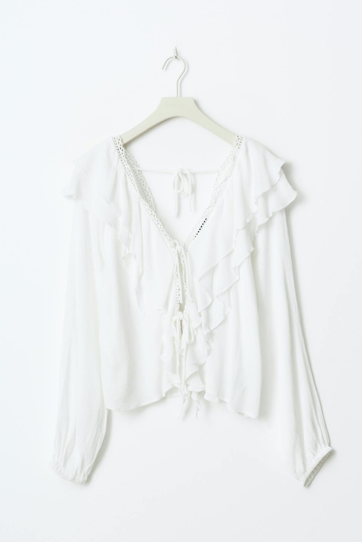 Frill tie blouse