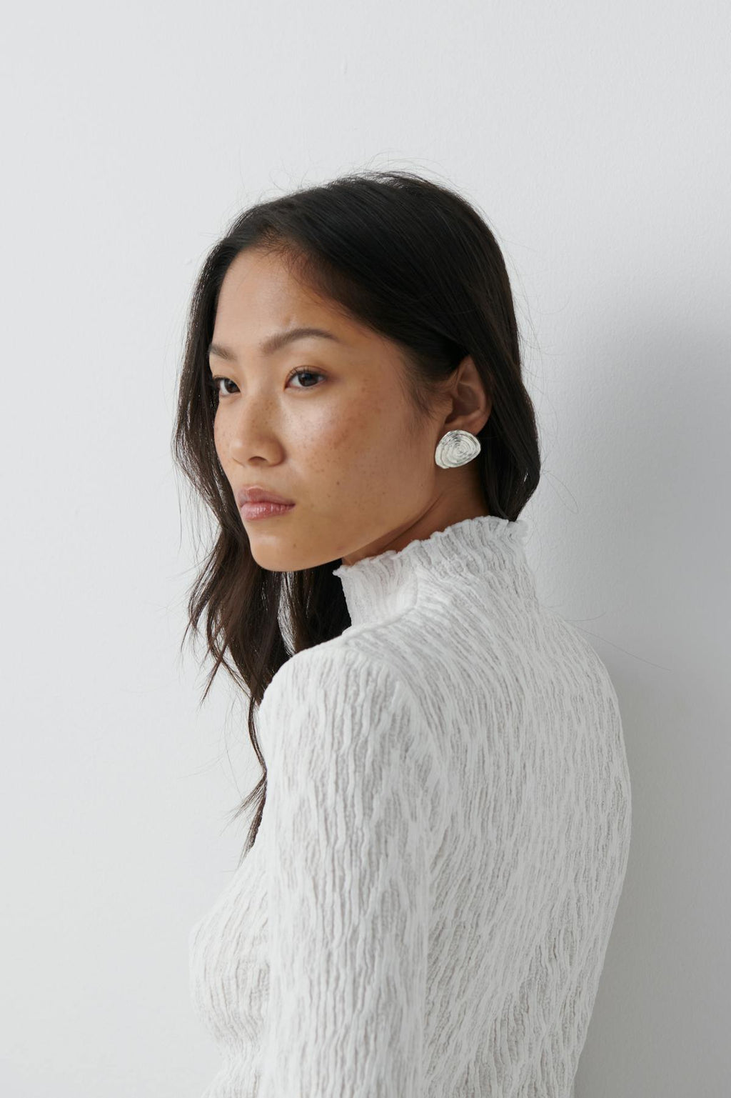 Textured funnel neck top