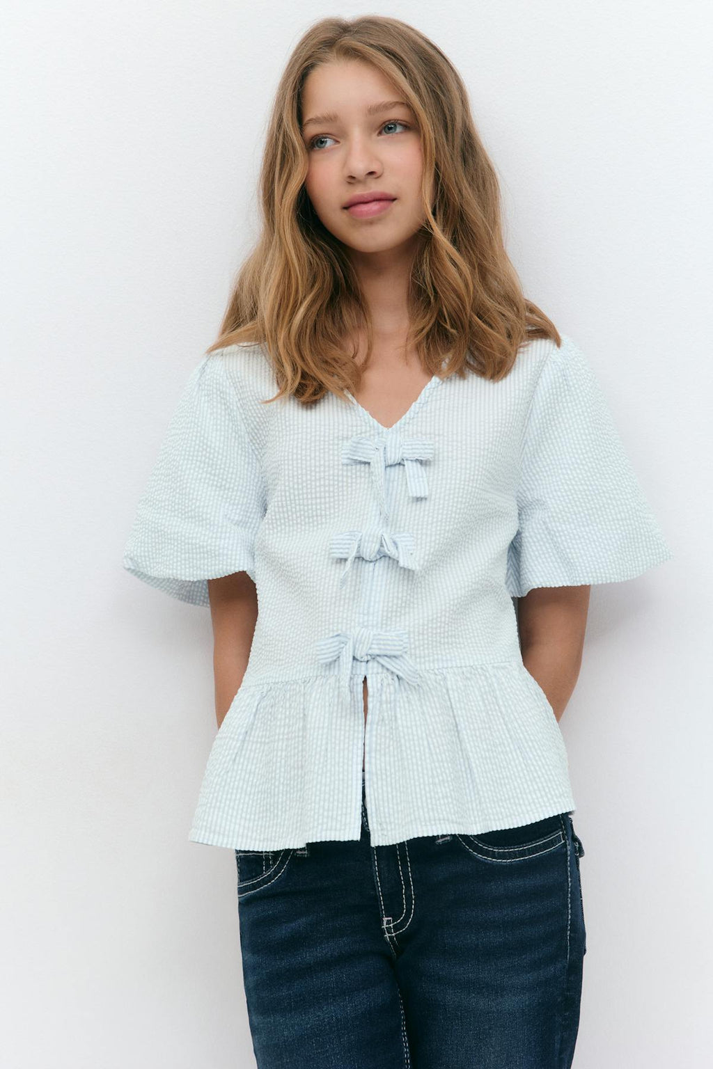 Y tie peplum top