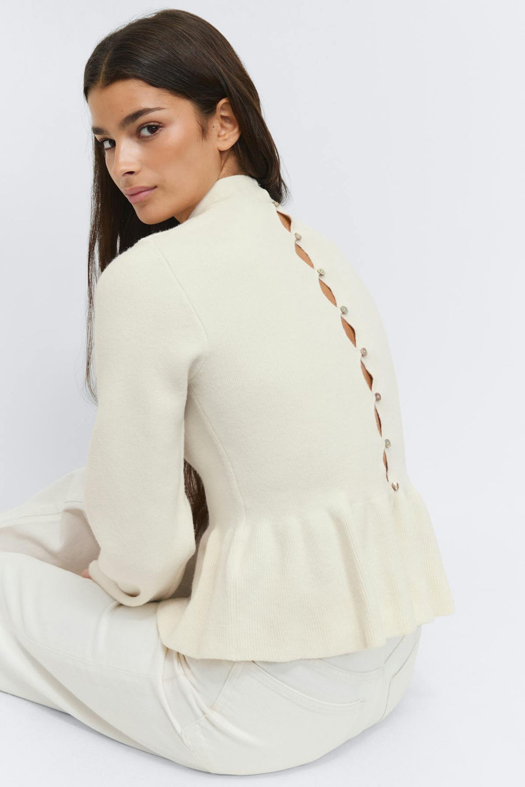 Knitted peplum top