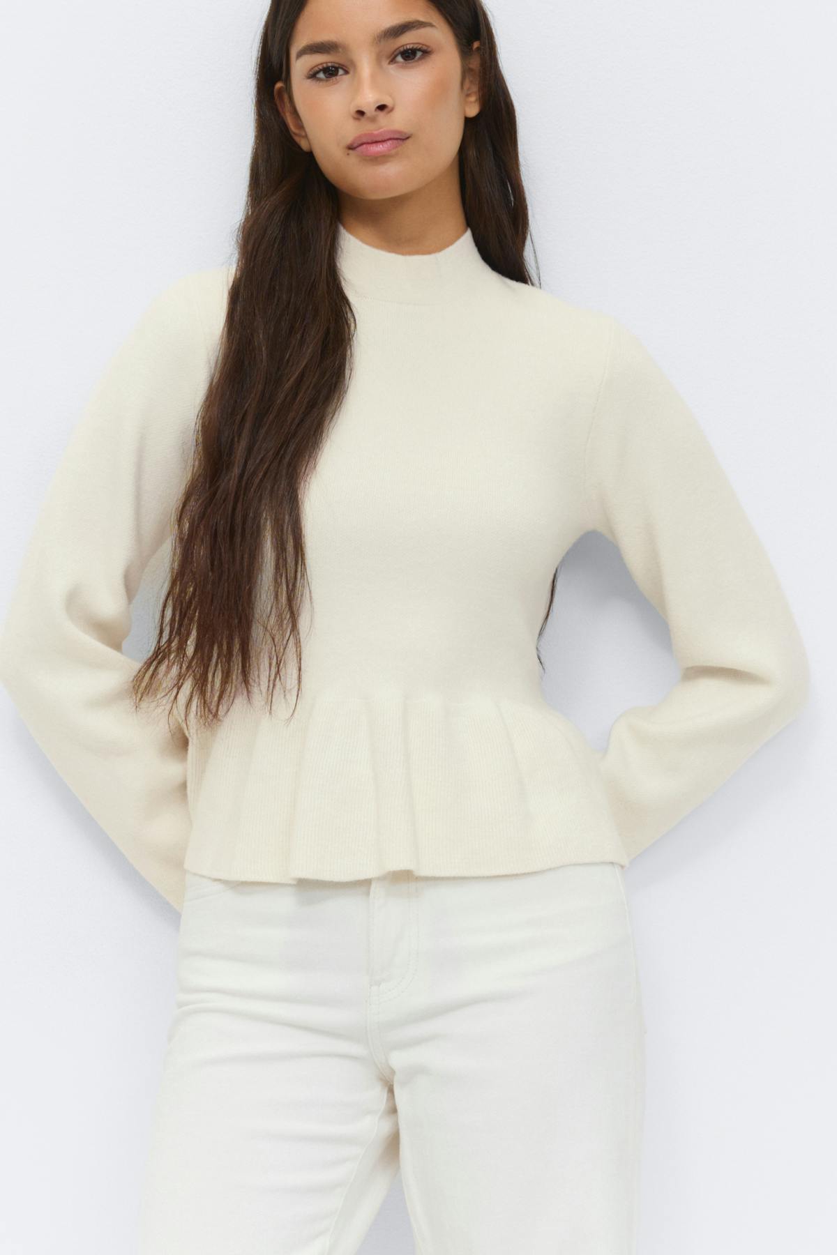Knitted peplum top