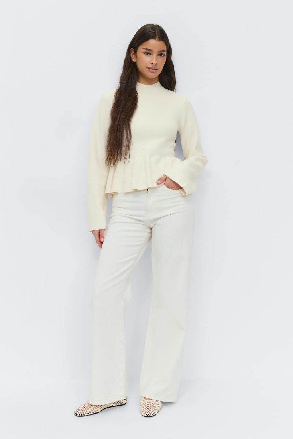 Knitted peplum top