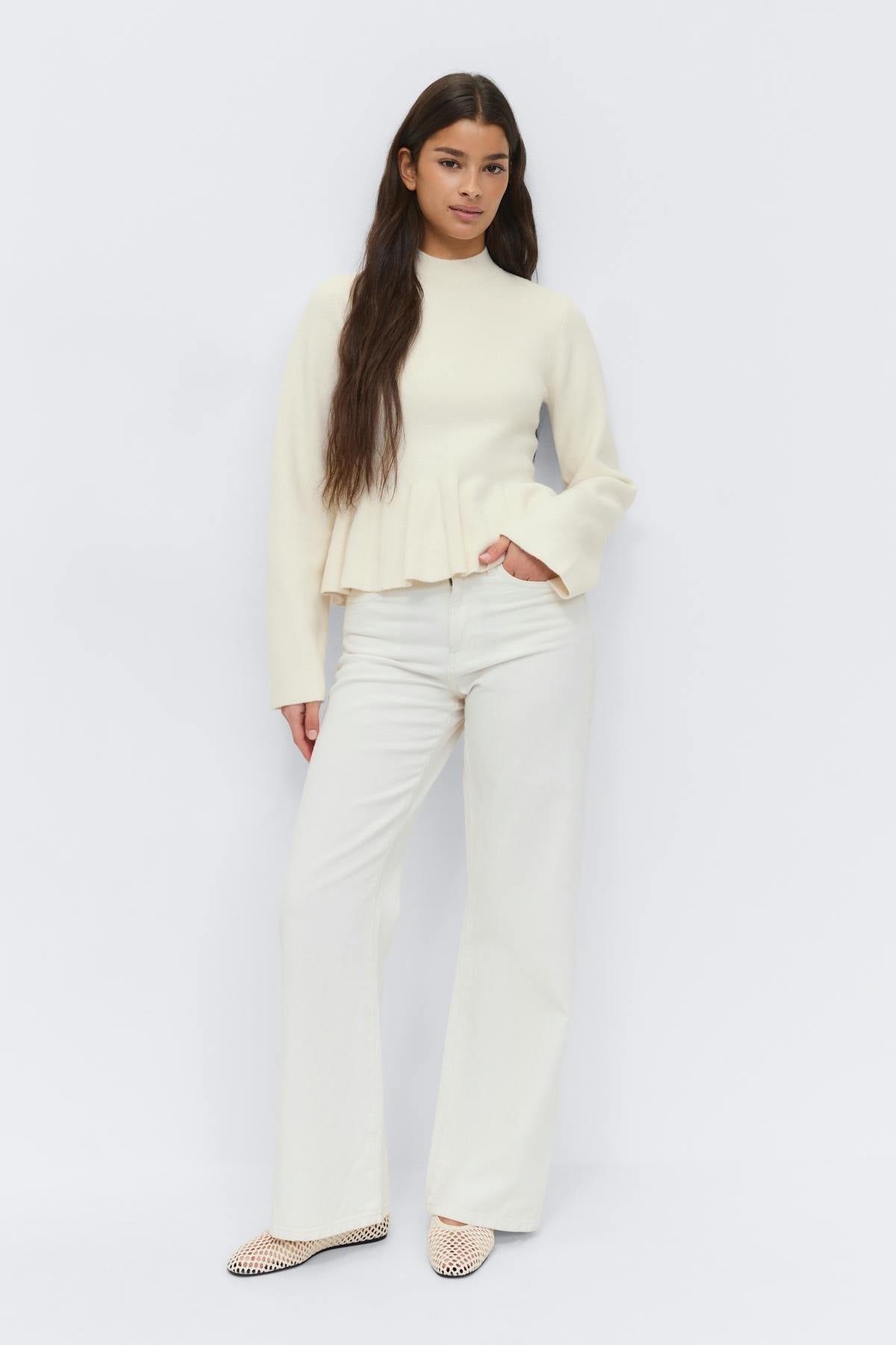 Knitted peplum top