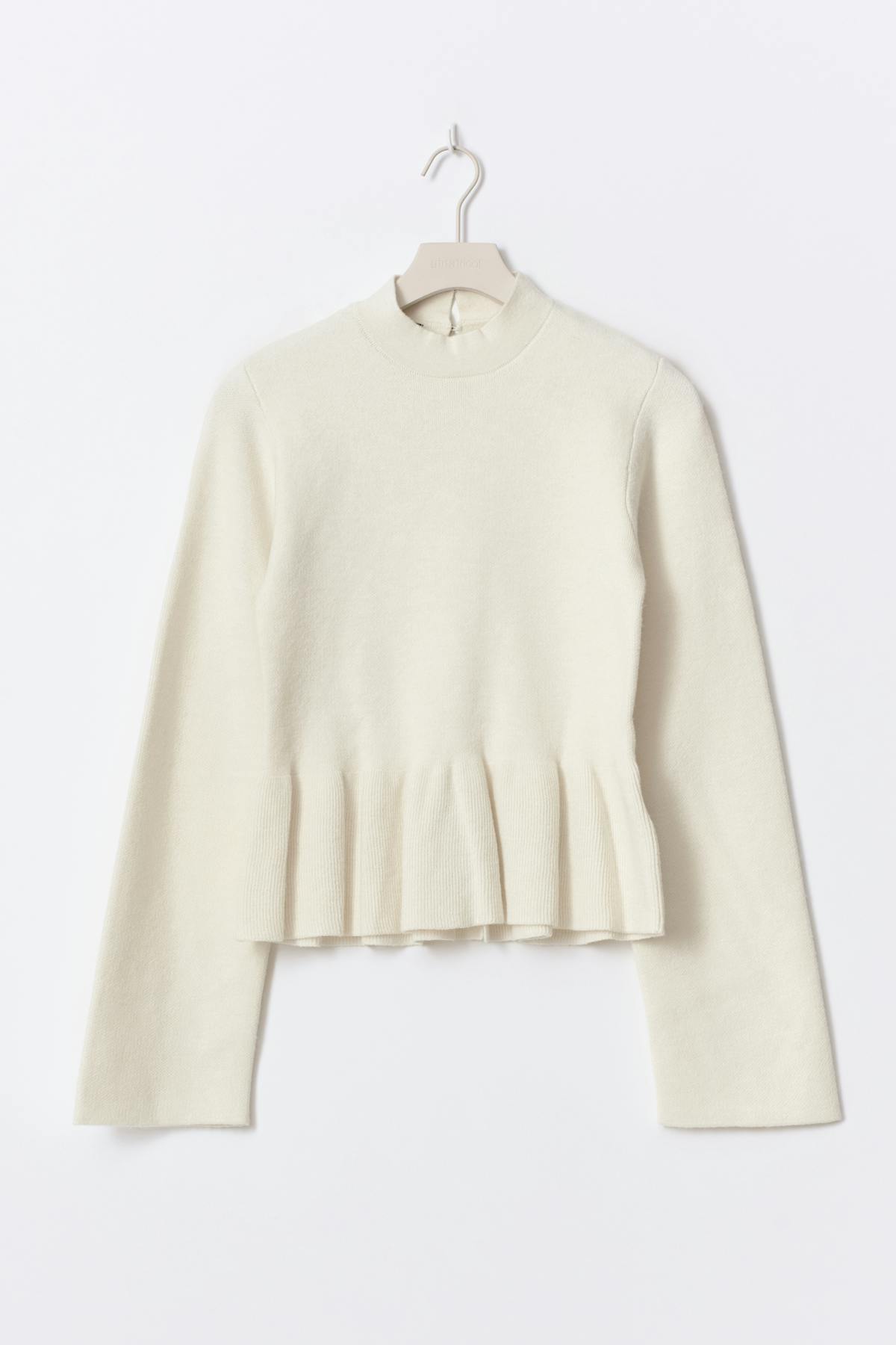 Knitted peplum top