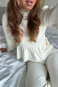 Knitted peplum top