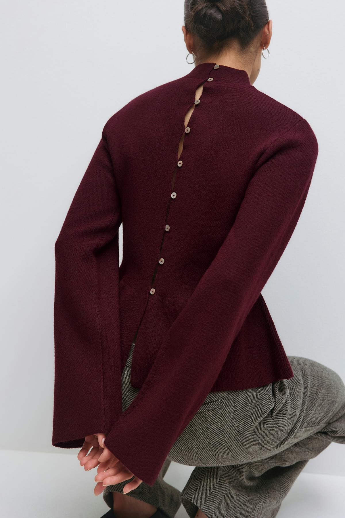Knitted peplum top
