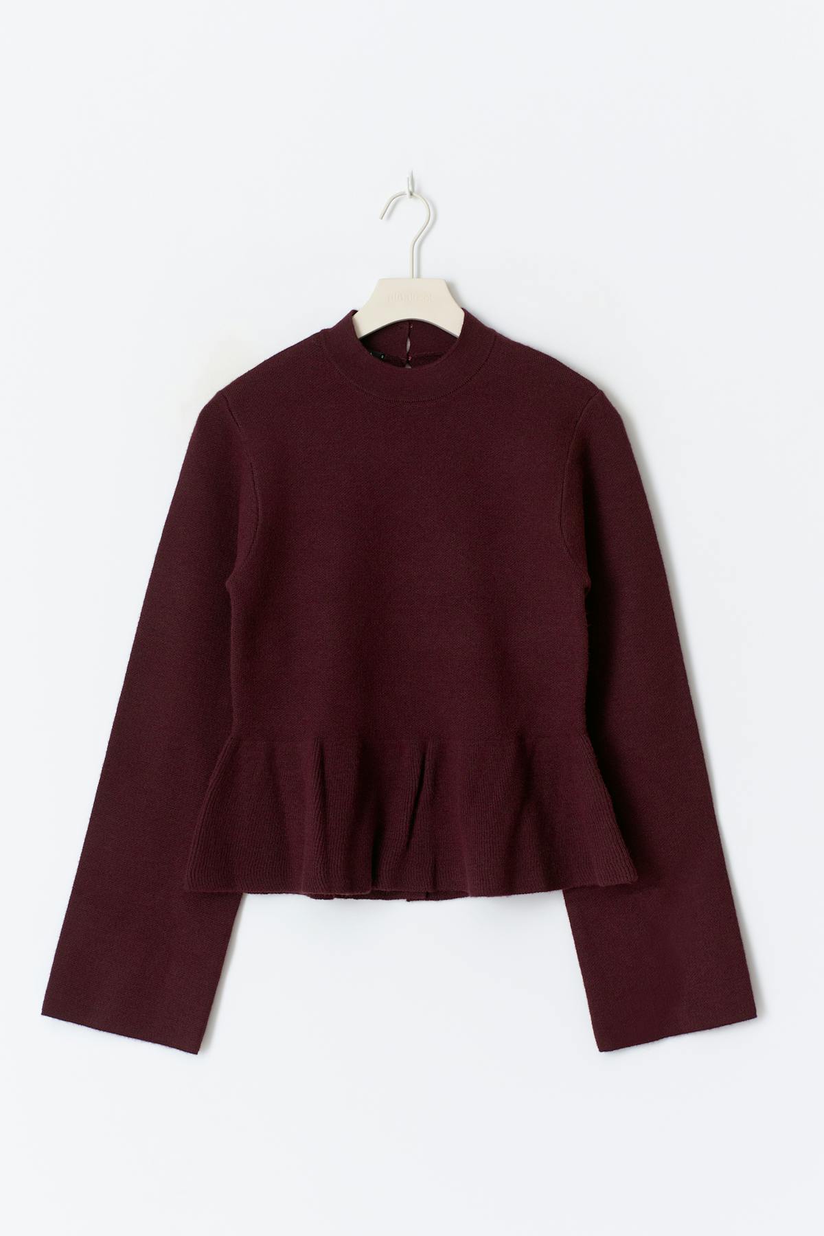 Knitted peplum top