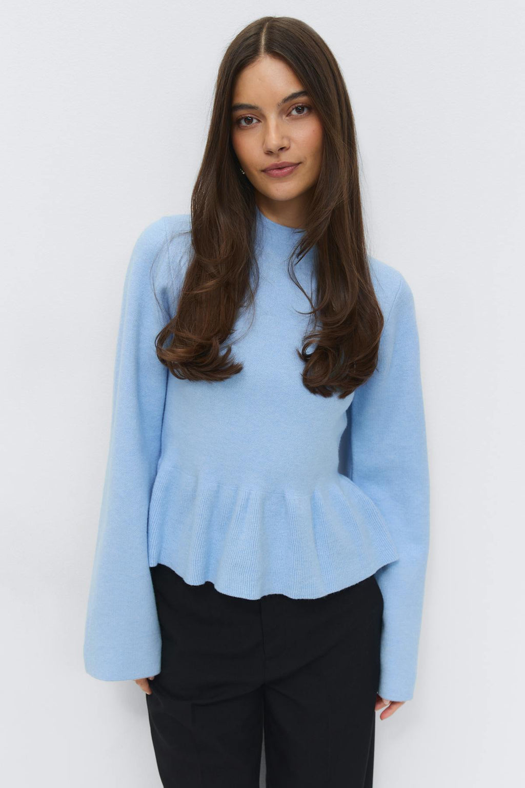 Knitted peplum top