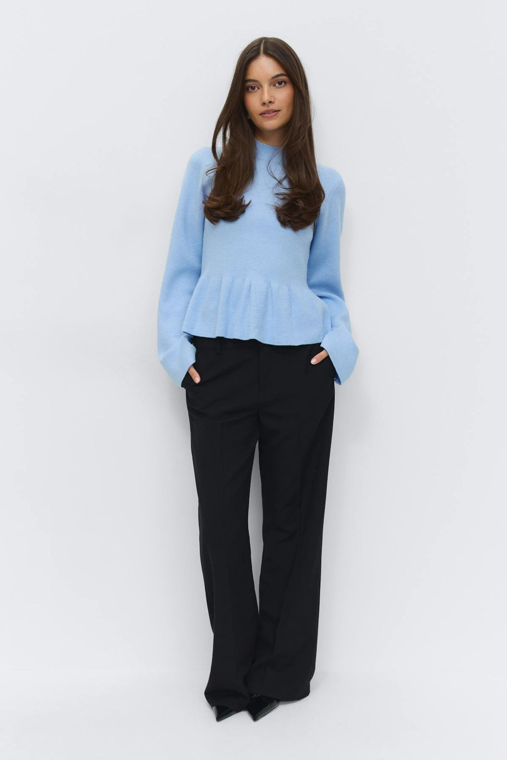 Knitted peplum top