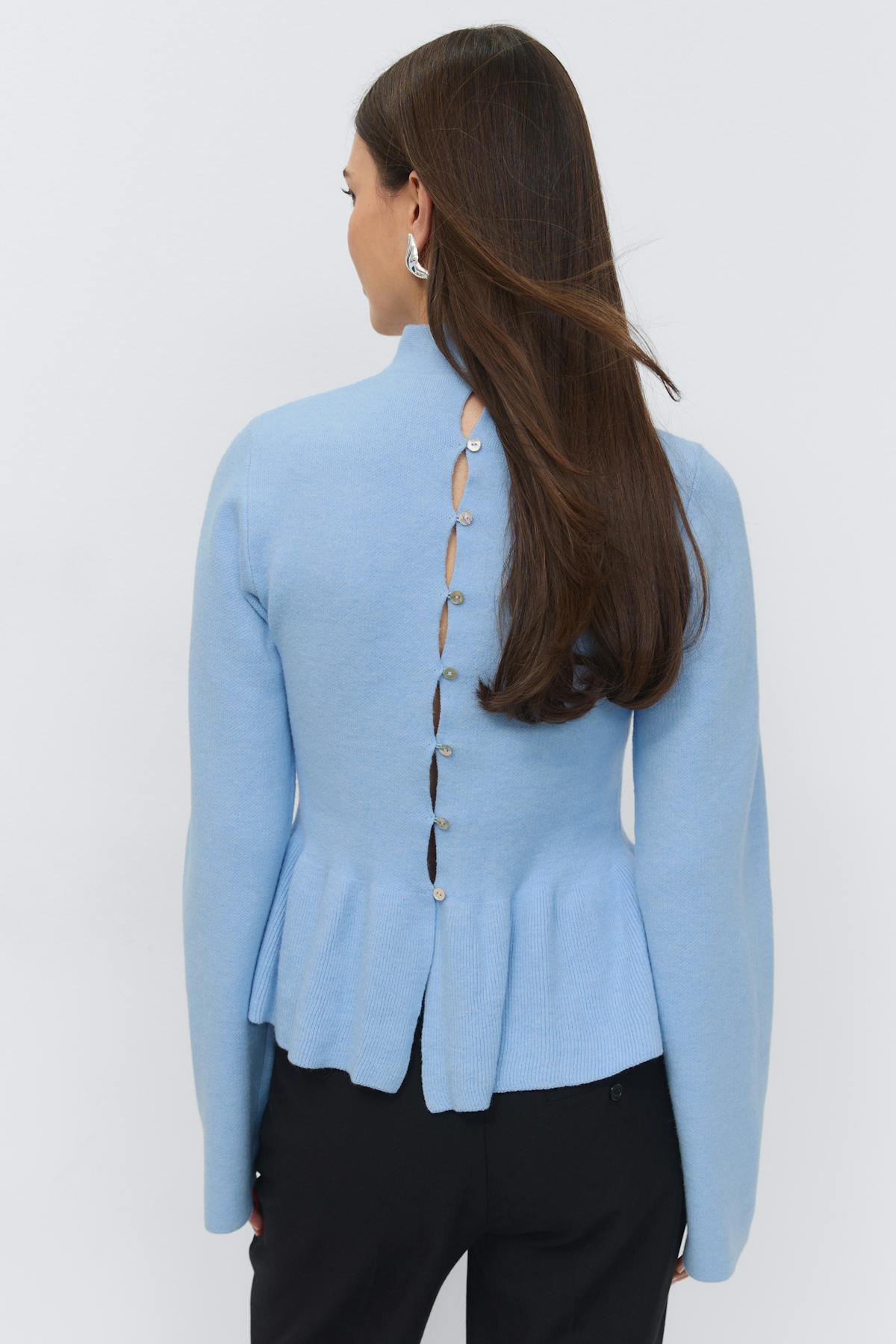 Knitted peplum top