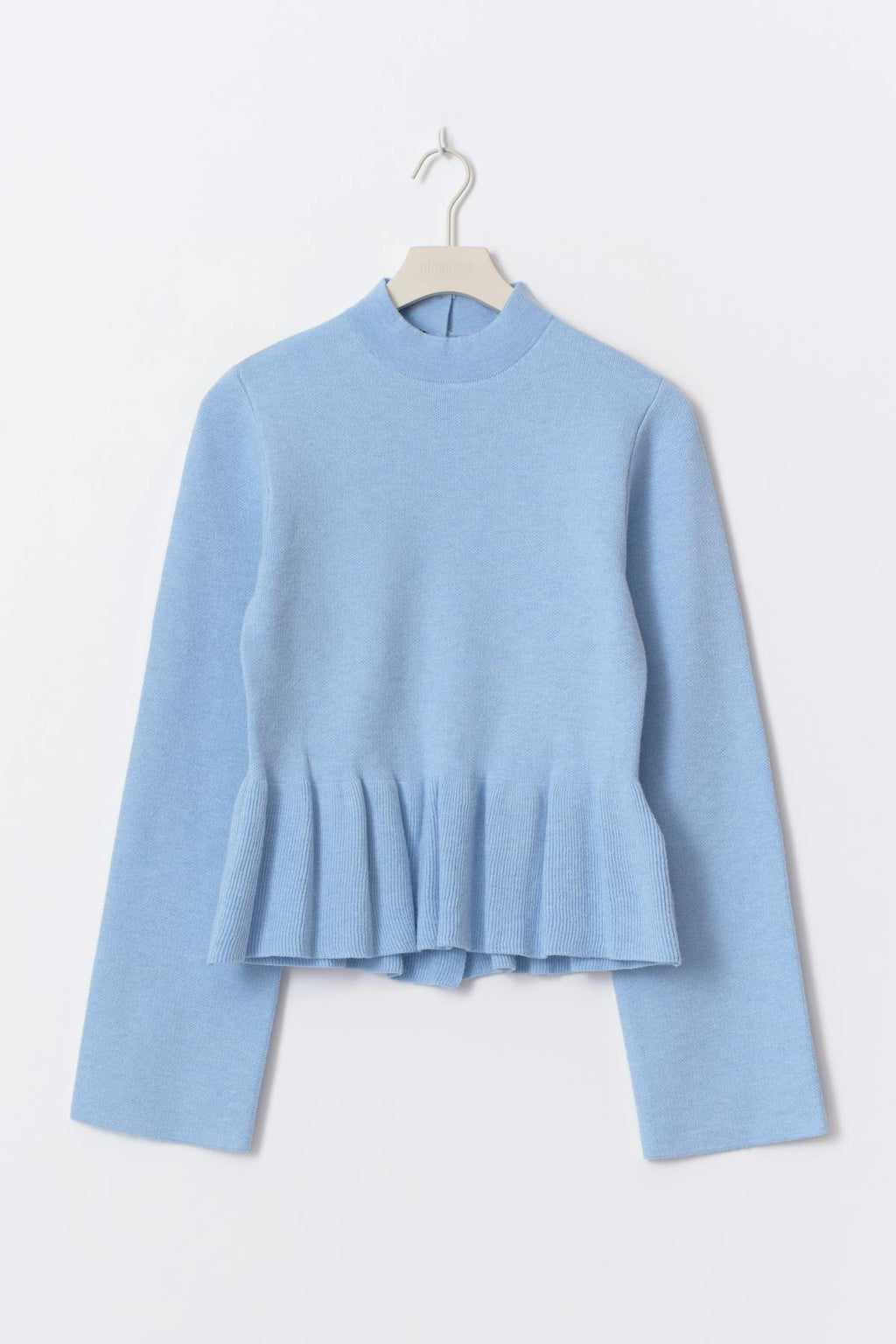 Knitted peplum top