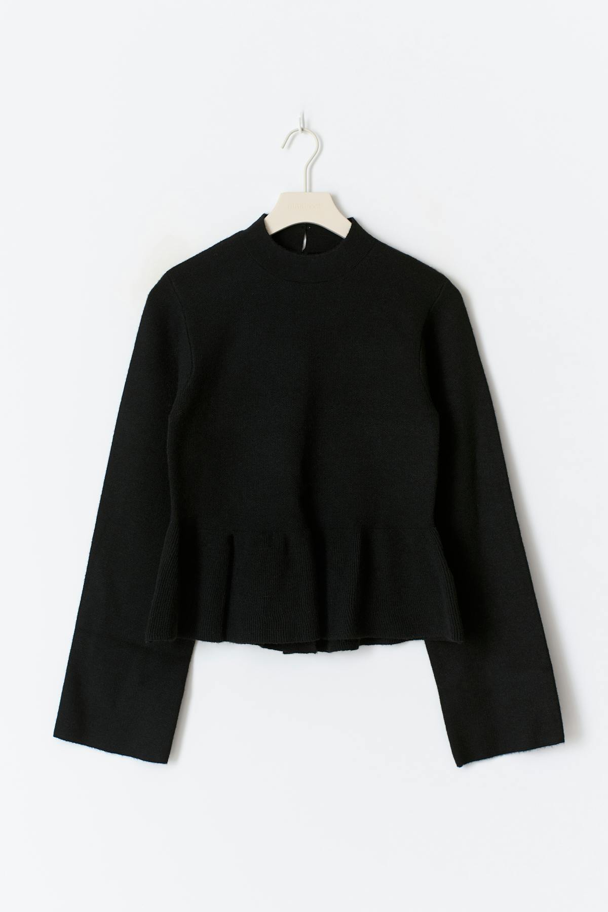 Knitted peplum top